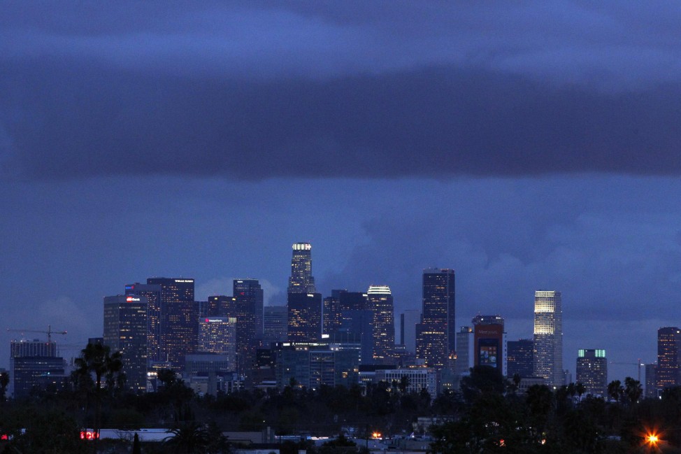 Low clouds hover over the Los Angeles downtown skyline in Los Angeles
