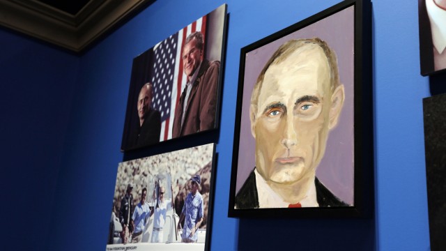 A portrait of Russian President Vladimir Putin, painted by former U.S. President George W. Bush, is displayed at 'The Art of Leadership: A President's Personal Diplomacy' exhibit in Dallas