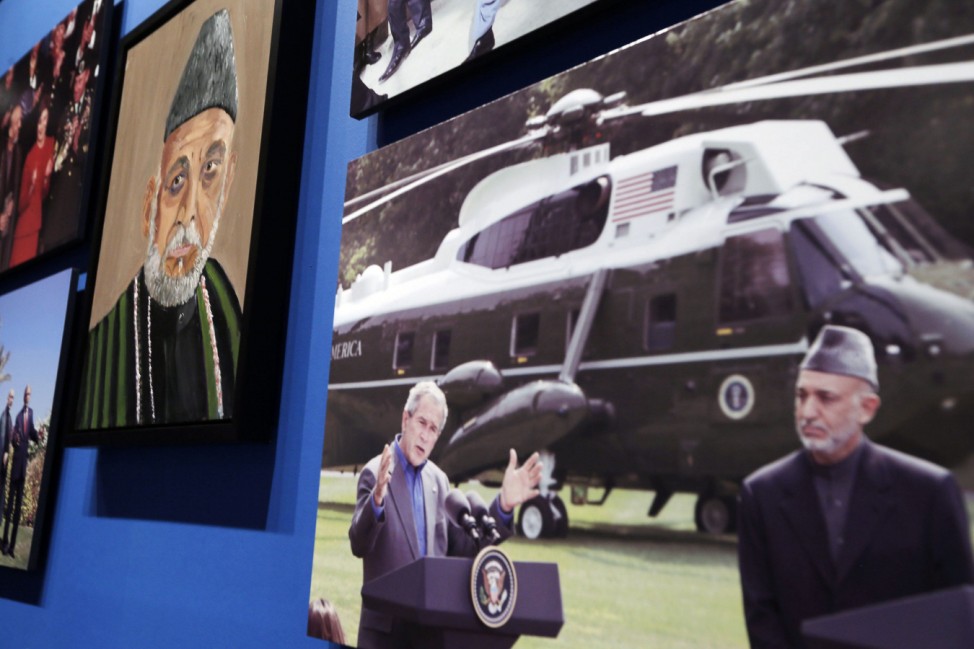 A portrait of Afghan President Hamid Karzai, painted by former U.S. President George W. Bush, is displayed at 'The Art of Leadership: A President's Personal Diplomacy' exhibit in Dallas