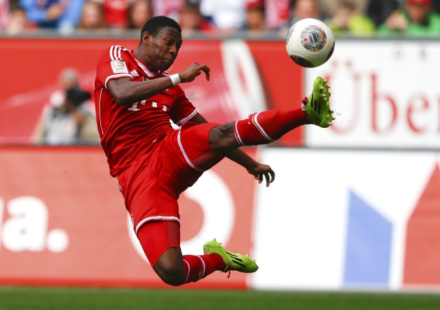 Bayern Munich's Alaba tries to score during their German first division Bundesliga soccer match in Augsburg