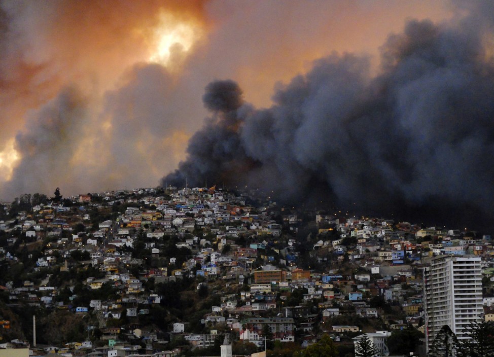 Smoke from a forest fire is seen in Valparaiso city