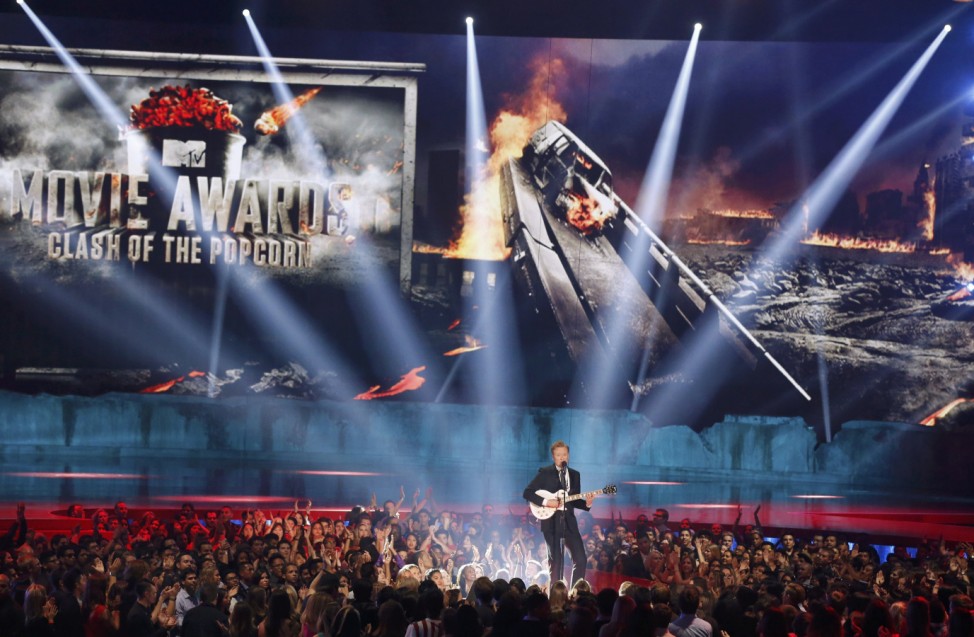 Show host Conan O'Brien opens the show at the 2014 MTV Movie Awards in Los Angeles