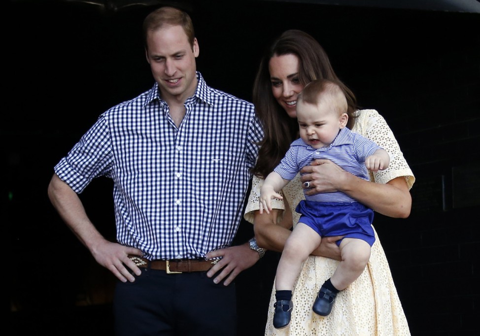 Catherine, the Duchess of Cambridge, and her husband Britain's Prince William, watch as their son Prince George looks at an Australian animal called a Bilby, which has been named after the young Prince, during a visit to Sydney's Taronga Zoo