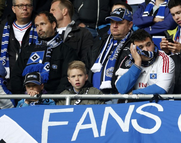 Hamburger SV supporters react after German first division Bundesliga soccer match against Augsburg in Augsburg