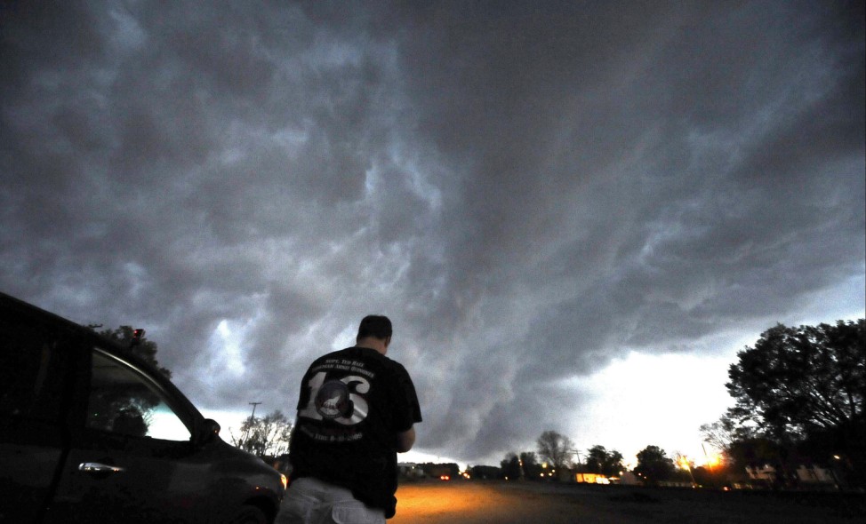 Storm chaser Mack take photos of a low level thunder storms supercells pass over the area of Bearden