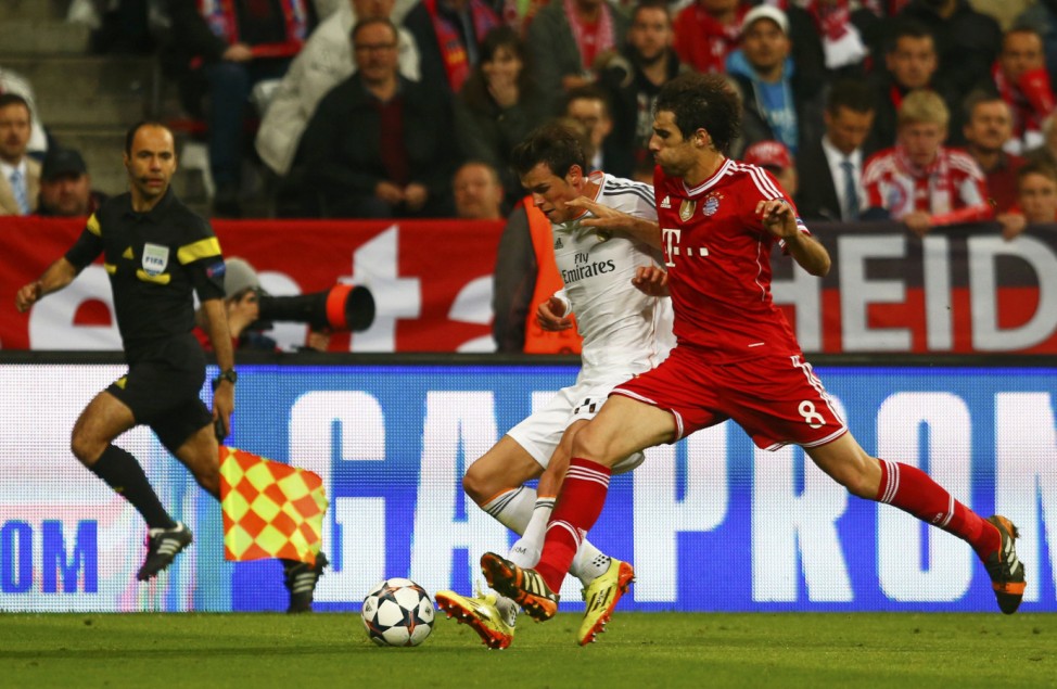 Bayern Munich's Martinez challenges Real Madrid's Bale during their Champions League semi-final second leg soccer match in Munich