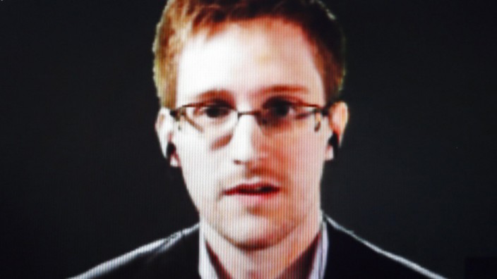 File photo of accused U.S. government whistleblower Snowden speaking via video conference in Strasbourg
