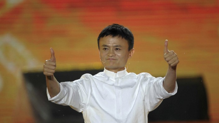 File photo of Alibaba founder Ma gesturing during celebration of 10th anniversary of Taobao Marketplace in Hangzhou