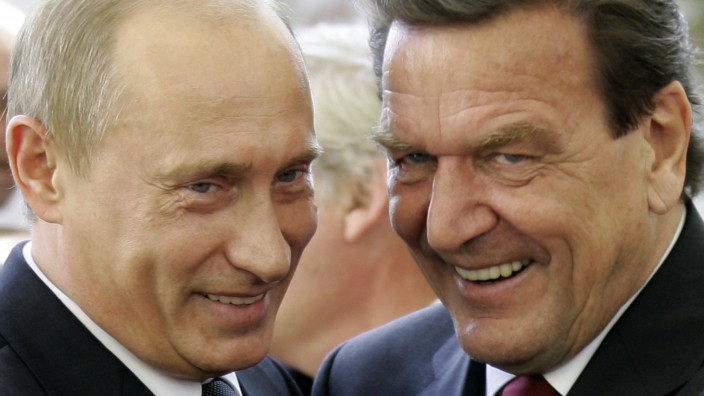File photo of Russia's President Putin and German Chancellor Schroeder