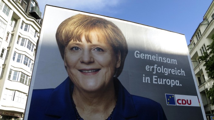 An European Parliament election campaign poster showing German Chancellor Merkel is pictured in Berlin