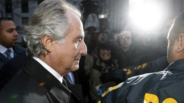 File of Bernard Madoff  departing US Federal Court after a hearing in New York