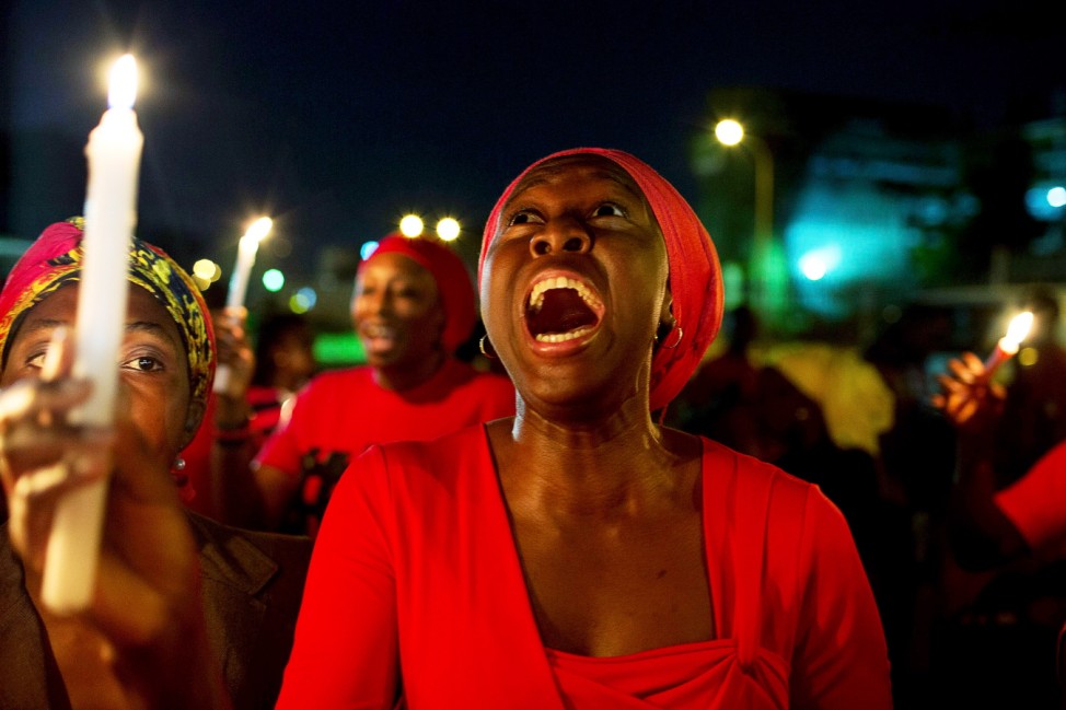 A woman shouts during a vigil in Abuja calling for the release of Nigerian schoolgirls abducted in Chibok