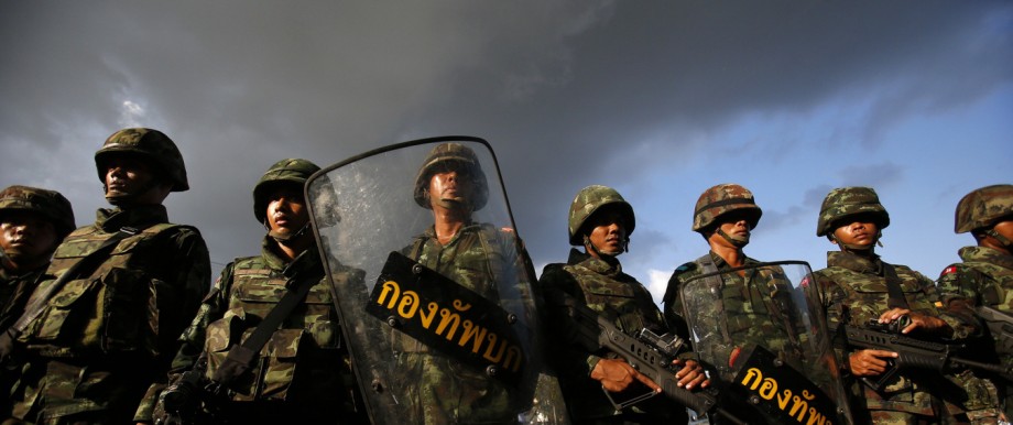 Thai soldiers stand guard during a coup at the Army Club in central Bangkok