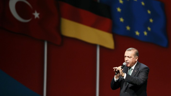 Turkish Prime Minister Erdogan speaks to supporters during his visit in Cologne