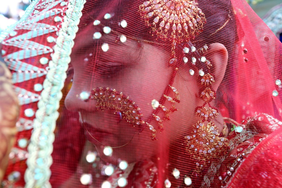 Muslim brides take part in a mass marriage ceremony in Bhopal
