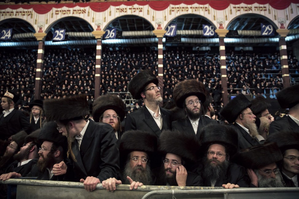 Ultra-orthodox Jews take part in celebrations after a wedding ceremony in Jerusalem