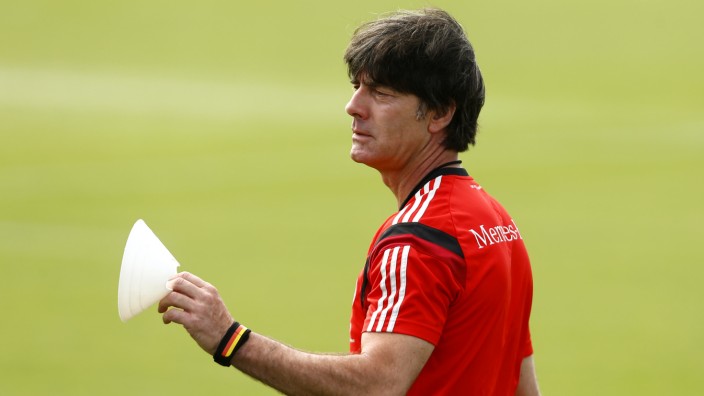 Germany's national soccer coach Loew gestures during a training session in the village of Santo Andre