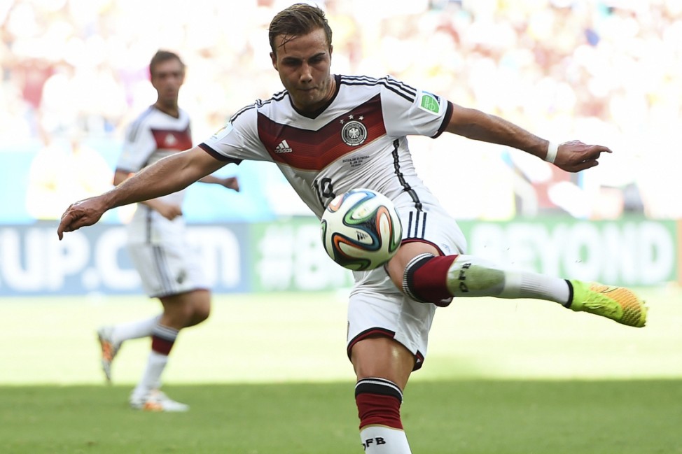 Germany's Goetze kicks the ball during their 2014 World Cup Group G soccer match against Portugal at the Fonte Nova arena in Salvador
