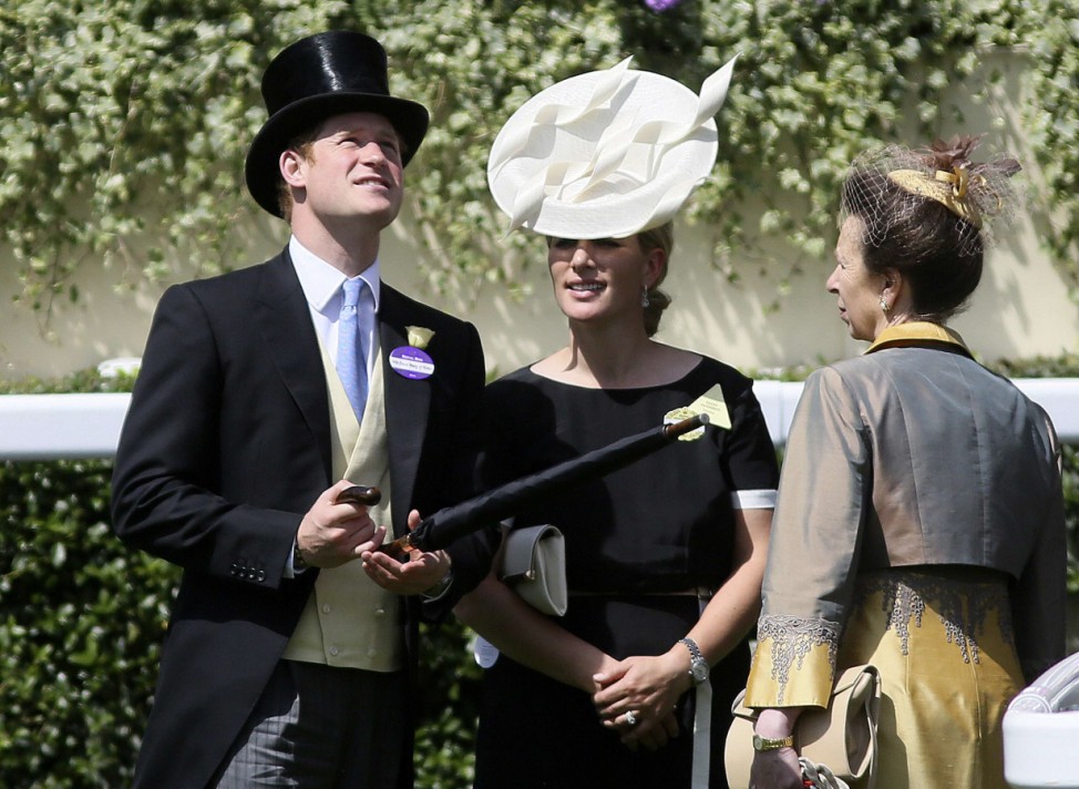 Britain's Prince Harry, Zara Phillips and Princess Anne look on at the Royal Ascot horse racing festival at Ascot