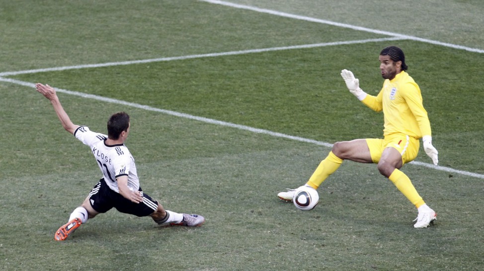 Germany's Klose scores a goal past England's goalkeeper James during a 2010 World Cup second round soccer match at Free State stadium in Bloemfontein