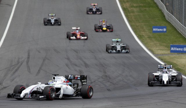 Williams Formula One driver Massa of Brazil leads the pack at the start during the Austrian F1 Grand Prix at the Red Bull Ring circuit in Spielberg