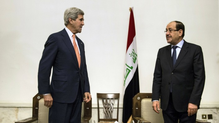 John Kerry und Nuri al-Maliki in Bagdad