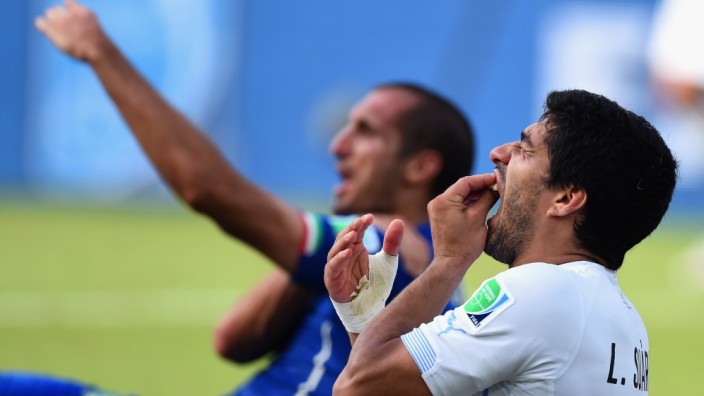FILE: Uruguay Striker Luis Suarez Has Been Suspended For four Months