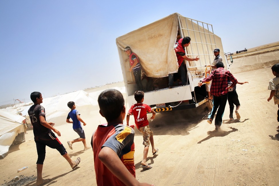 BESTPIX Refugees Fleeing ISIS Offensive Pour Into Kurdistan