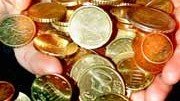 Identifizierung von Falschmünzen: In Großbritannien arbeiten Spezialisten bei der Münzbehörde daran, Geldfälschungen anhand des Klanges zu identifizieren.