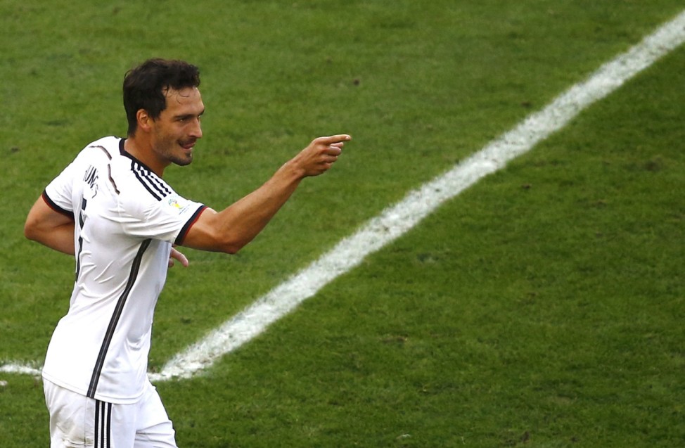 Germany's Mats Hummels celebrates after scoring a goal during the 2014 World Cup quarter-finals between France and Germany at the Maracana stadium