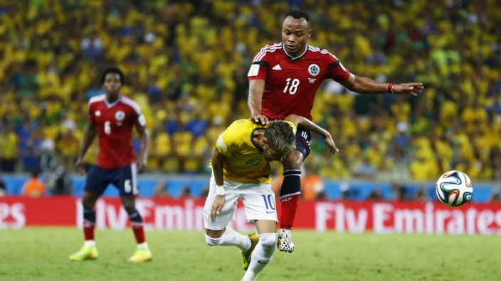 Brazil's Neymar is fouled by Colombia's Camilo Zuniga during 2014 World Cup quarter-finals at Castelao arena in Fortaleza