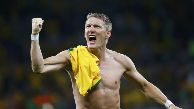 Germany's Schweinsteiger celebrates his team's win over Brazil after their 2014 World Cup semi-finals at the Mineirao stadium in Belo Horizonte