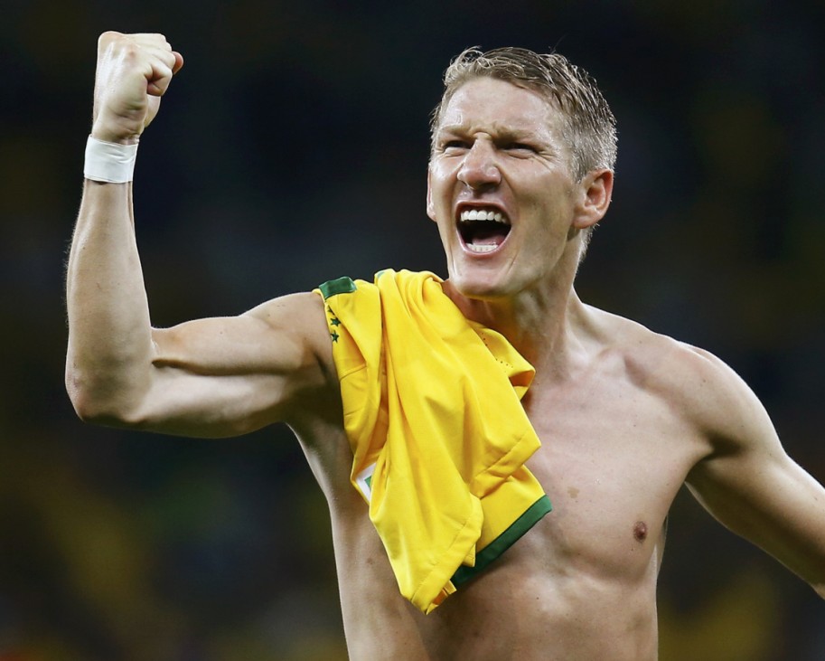 Germany's Schweinsteiger celebrates his team's win over Brazil after their 2014 World Cup semi-finals at the Mineirao stadium in Belo Horizonte