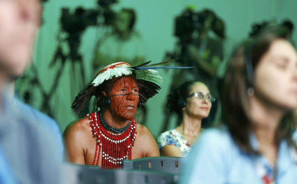A native Brazilian attends a news conference of Germany's national soccer team in the village of Santo Andre