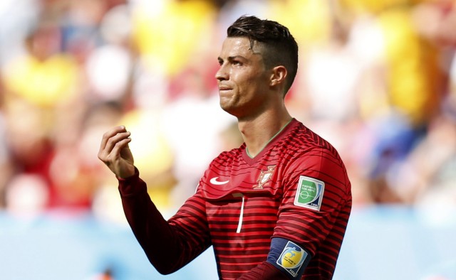 Portugal's Cristiano Ronaldo gestures after missing a shot during their 2014 World Cup Group G soccer match against Ghana at the Brasilia national stadium