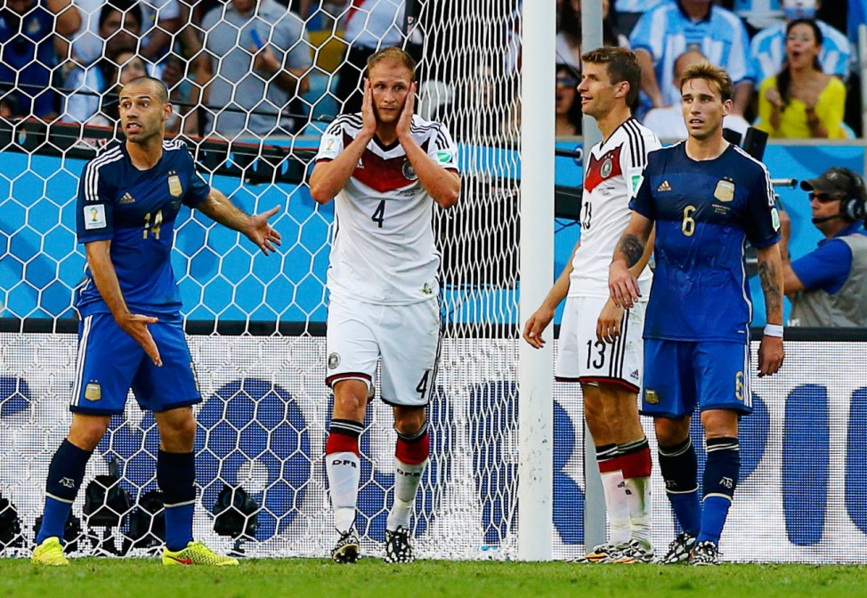 Germany's Hoewedes reacts after missing a goal scoring opportunity against Argentina during their 2014 World Cup final at the Maracana stadium in Rio de Janeiro