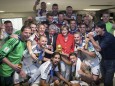 German Chancellor Merkel and German President Gauck pose with the Germany's coach Loew and his players after Germany beat Argentina in the 2014 World Cup final at the Maracana stadium in Rio de Janeiro