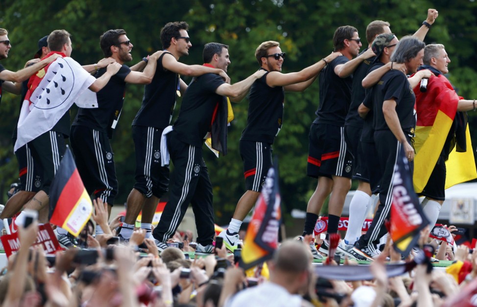 Members of Germany's 2014 Brazil World Cup appear on stage during celebrations at 'fan mile' in Berlin