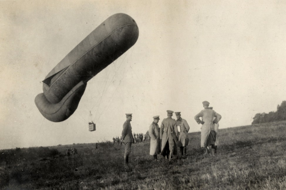 German officers stand near an observation balloon near the Western Front in this handout picture taken in 1915