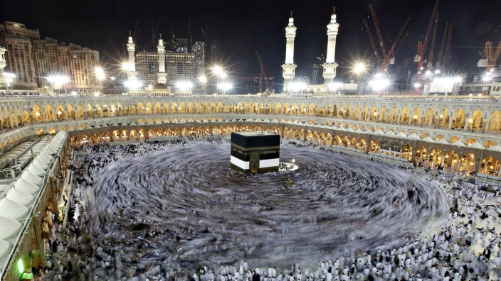 Muslim pilgrims circle the Kaaba and pray at the Grand mosque during the annual haj pilgrimage in the holy city of Mecca