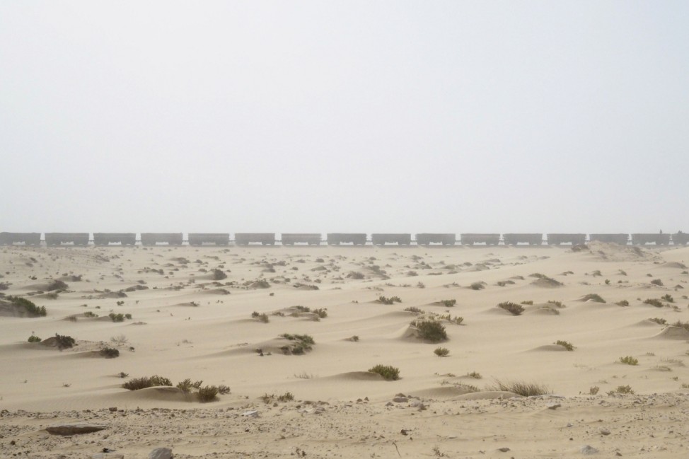 A SNIM train carrying iron ore arrives in Nouadhibou