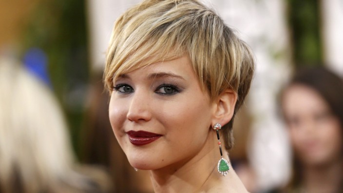 Actress Jennifer Lawrence arrives at the 71st annual Golden Globe Awards in Beverly Hills