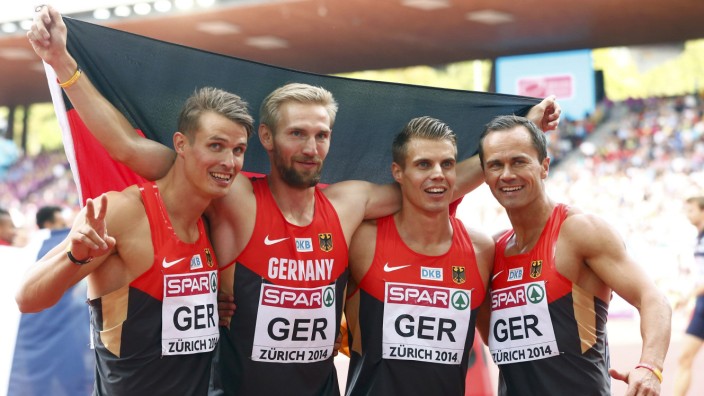 Reus, Jakubczyk, Knipphals and Kosenkow of Germany celebrate their second place in the men's 4 x 100 metres final during the European Athletics Championships at the Letzigrund Stadium in Zurich