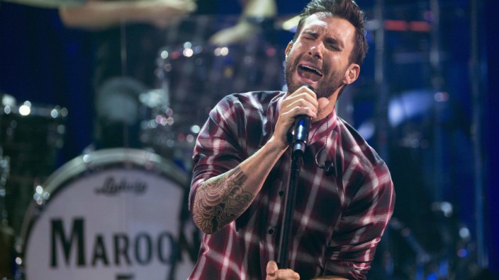 Adam Levine of pop rock band Maroon 5 performs during the band's album release party for 'V' at the iHeartRadio theatre in Burbank