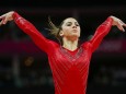 McKayla Maroney of the U.S. gestures after performing on the vault during the women's gymnastics team final in the North Greenwich Arena at the London 2012 Olympic Games