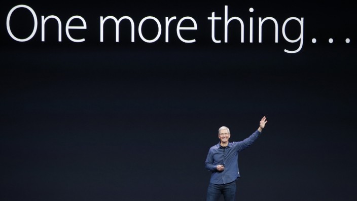 Apple CEO Tim Cook speaks on stage during an Apple event at the Flint Center in Cupertino