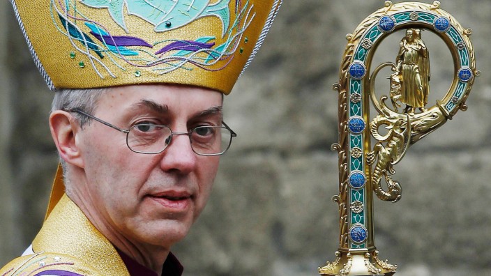 The new Archbishop of Canterbury Justin Welby leaves after his enthronement ceremony at Canterbury Cathedral, in Canterbury, southern England