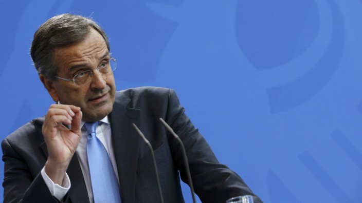 Greek Prime Minister Samaras addresses a joint news conference in Berlin