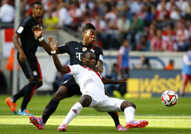 Bayern Munich's Alaba challenges Ujah of FC Cologne during their German first division Bundesliga soccer match in Cologne