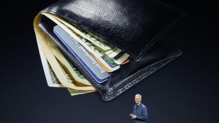 Apple CEO Tim Cook speaks about Apple Pay during an Apple event at the Flint Center in Cupertino
